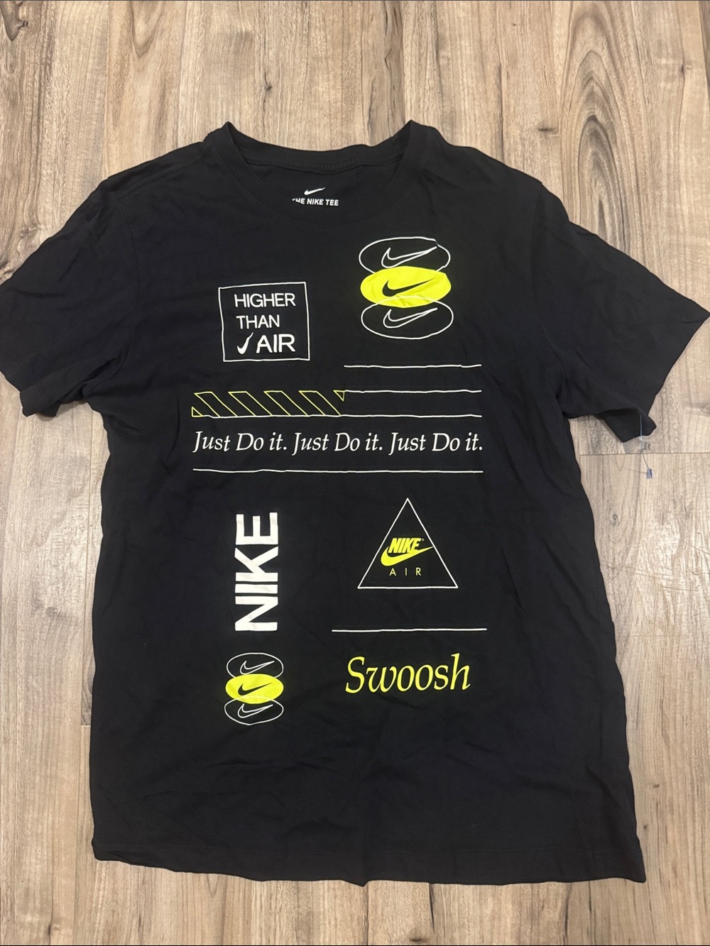 Nike Black Short-Sleeve Graphic Swoosh Tee with Yellow Accents